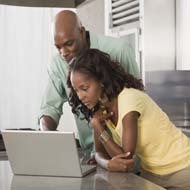 Couple with a laptop computer