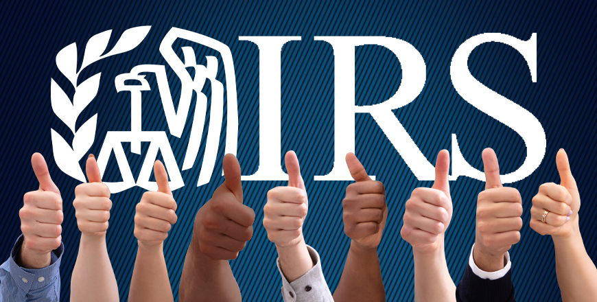 A row of people giving thumbs up in front of IRS logo