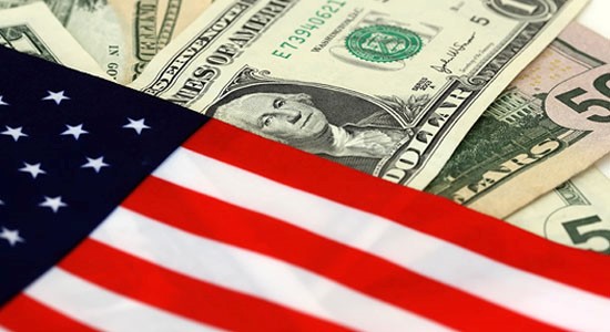 United States currency behind the United States flag.